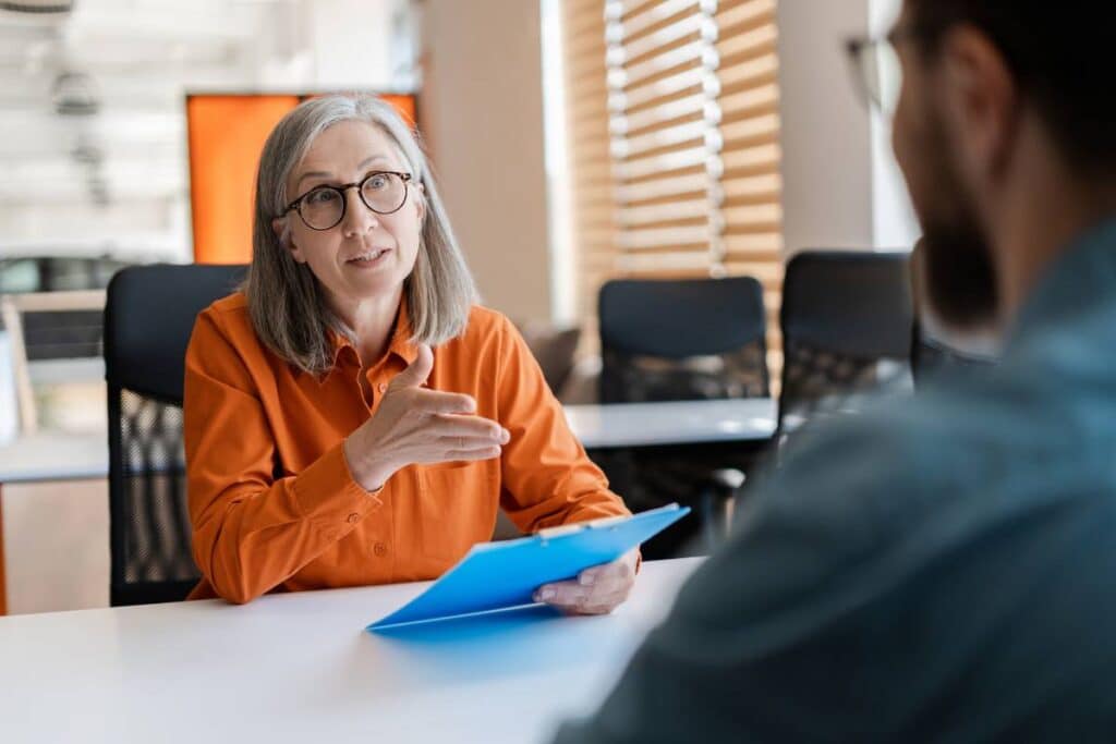 Chief Human Resources Officer (CHRO) offering guidance and insights in a professional one-on-one conversation.