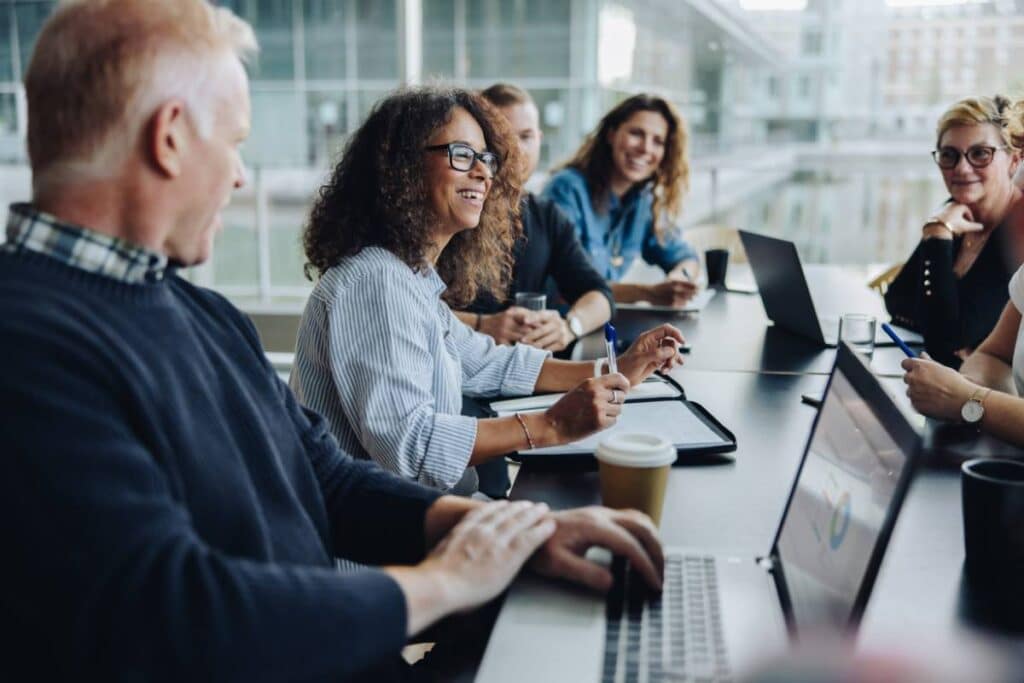 A group of investors integrating emotional intelligence into their financial decision-making process.