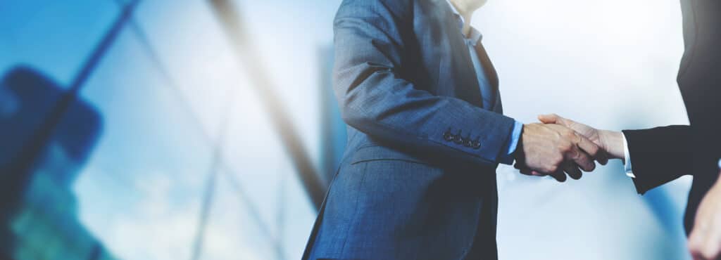 Businessmen agreeing on corporate growth initiatives